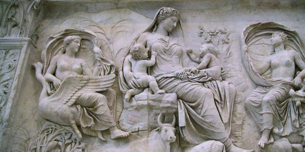 A relief from the Ara Pacis, an ancient Roman altar dedicated to Pax, the goddess of peace. The scene symbolizes prosperity, fertility, and Rome's divine favor under Augustus.