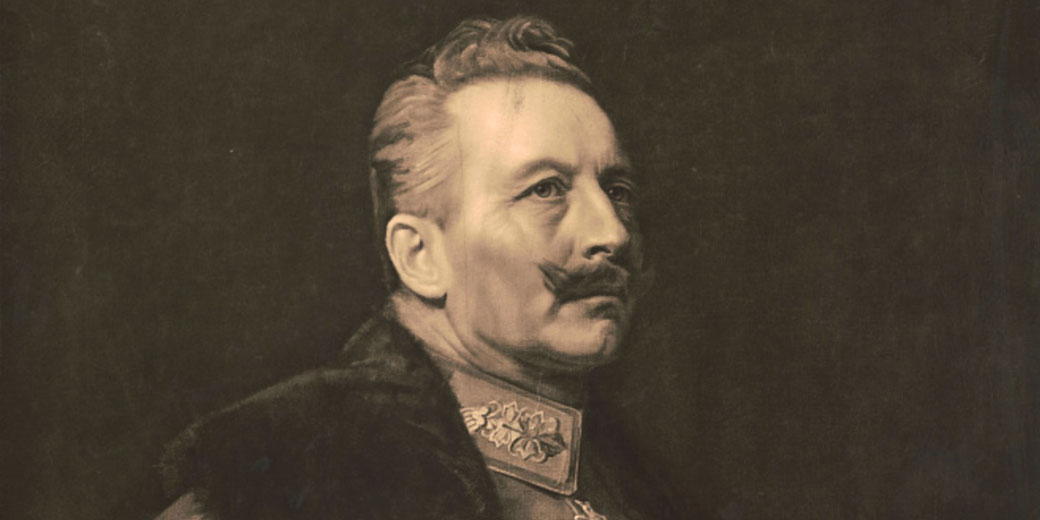 A sepia-toned portrait of a distinguished military leader with a mustache, wearing a decorated uniform with a fur collar.