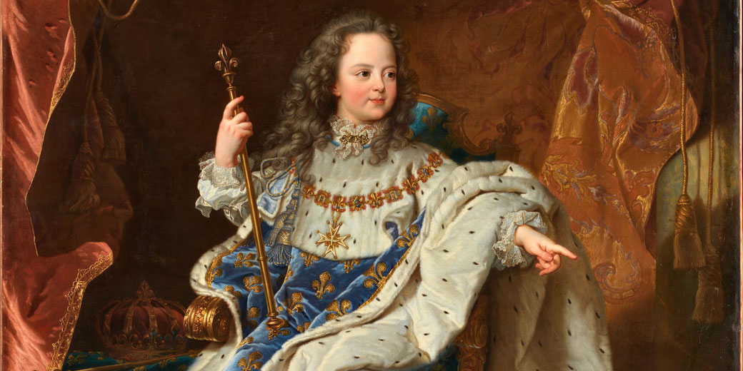 A five‑year‑old King Louis XV posed in full coronation robes, large and formal, standing in front of a red curtain with a statue in the background.
