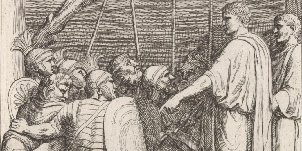 A Roman soldier presents a prisoner to the emperor, who stands elevated; Latin text appears below the scene.