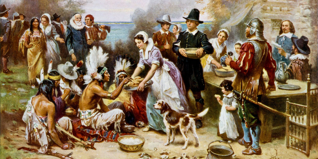 The First Thanksgiving, showing Pilgrims and Native Americans sharing a meal. A woman in a bonnet serves food, while others gather around, dressed in traditional attire.