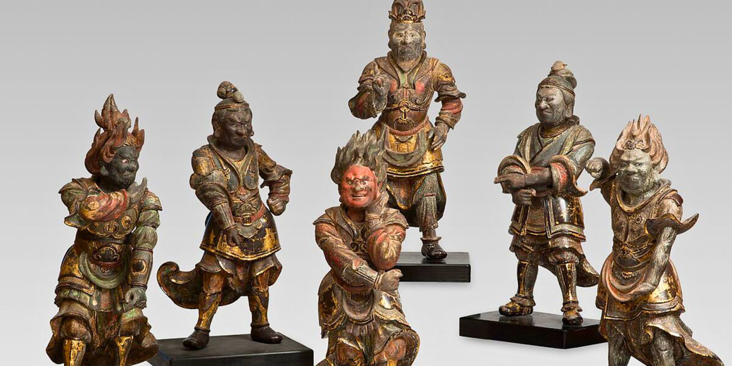 The Twelve Divine Generals, fierce guardian deities in Buddhist tradition. Each figure is adorned in elaborate armor with expressive faces and dynamic poses.