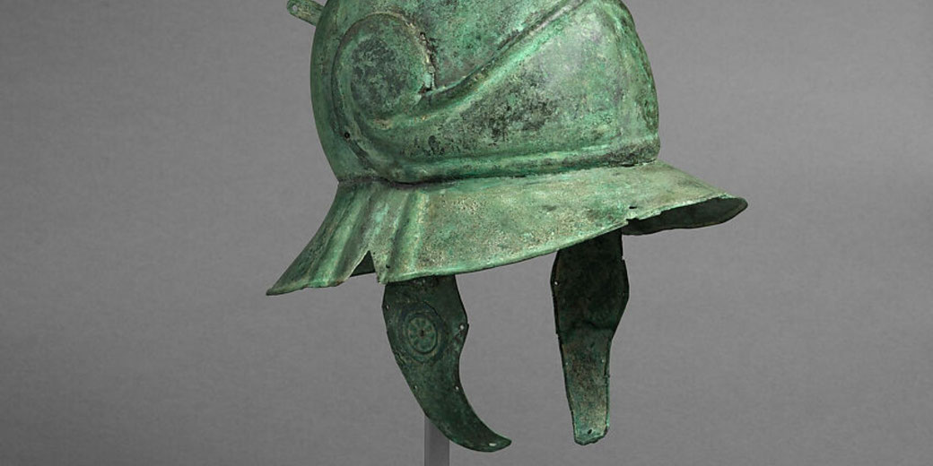A bronze Roman helmet and belt from the period close to the Second Punic War, useful for showing cavalry or elite military equipment.