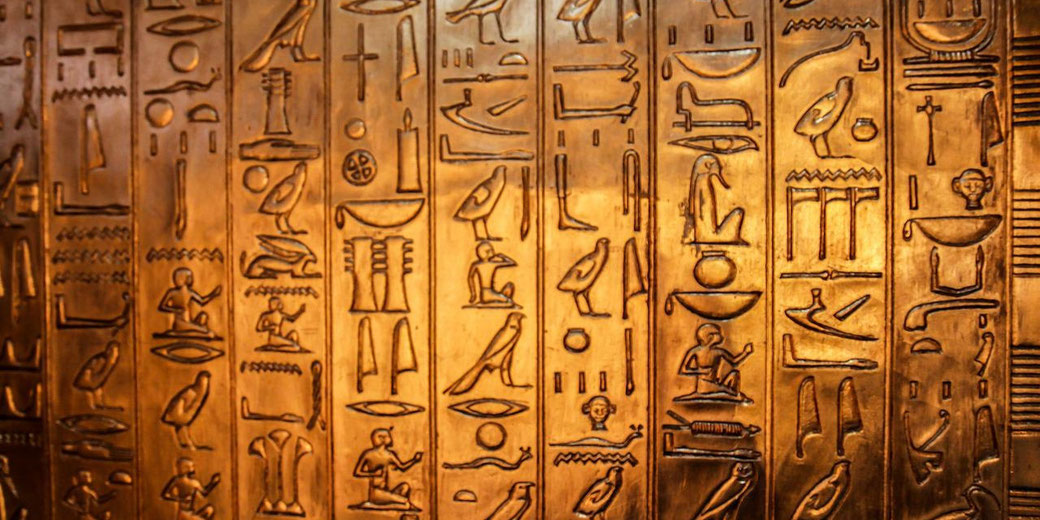 Image source: https://pixabay.com/photos/hieroglyphics-characters-golden-484697/