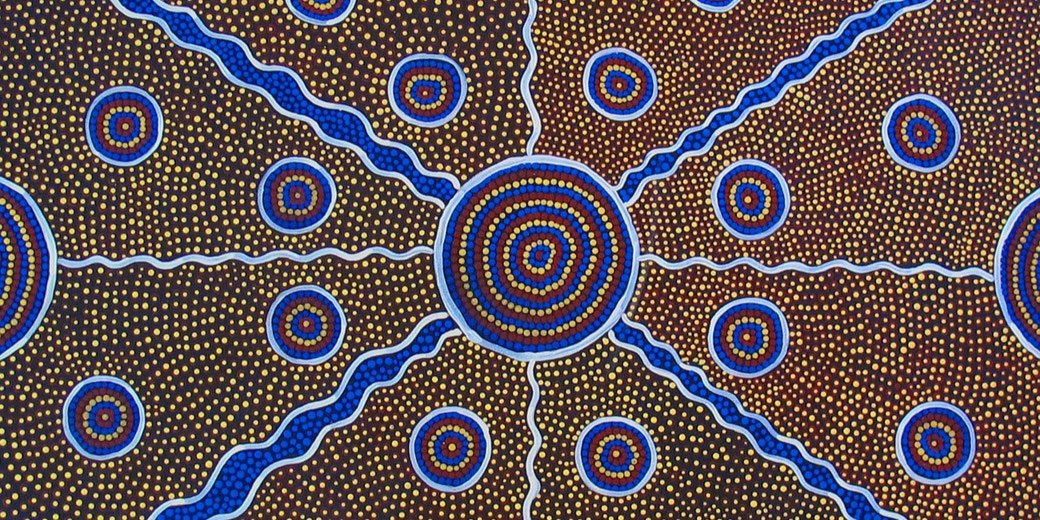 Colorful Aboriginal dot painting features concentric circles, wavy lines, and dotted patterns radiating from a central point.
