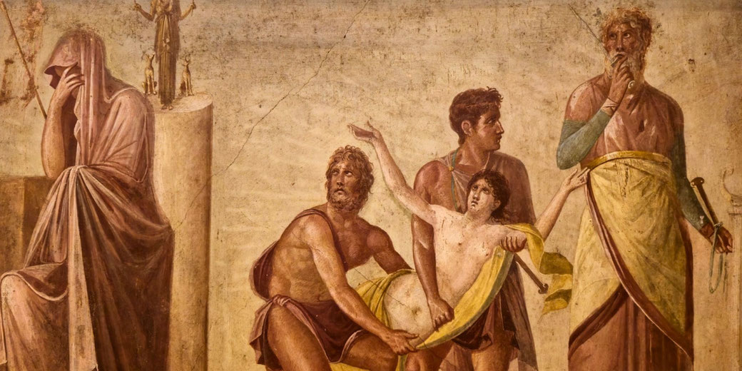 Ancient fresco showing a dramatic scene: a veiled figure mourns, while others prepare to sacrifice a struggling youth, with a goddess statue in the background.