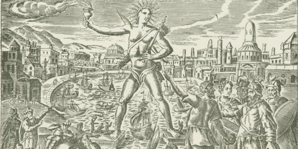 Engraving depicts the Colossus of Rhodes, a giant figure straddling a harbor as ships sail beneath and people observe.