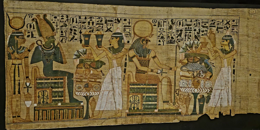 An Ancient Egyptian papyrus with deities and figures offering items to seated gods, adorned with hieroglyphic inscriptions and traditional artistic motifs.