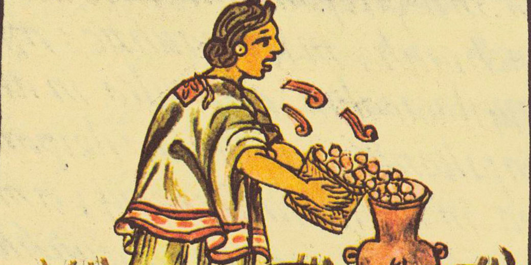 Aztec codex illustration depicts a woman blowing on maize as she pours it into a pot, possibly a ritual act or food preparation, wearing traditional clothing with red and white patterns.