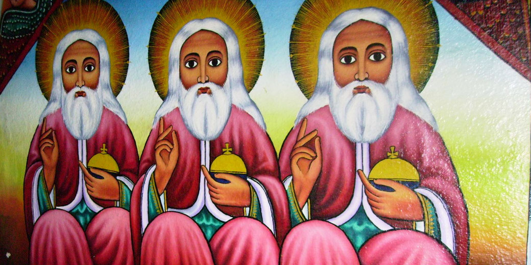 A vibrant Ethiopian religious painting featuring three haloed figures with white beards, holding orbs and making gestures of blessing. It reflects traditional Ethiopian Orthodox iconography.