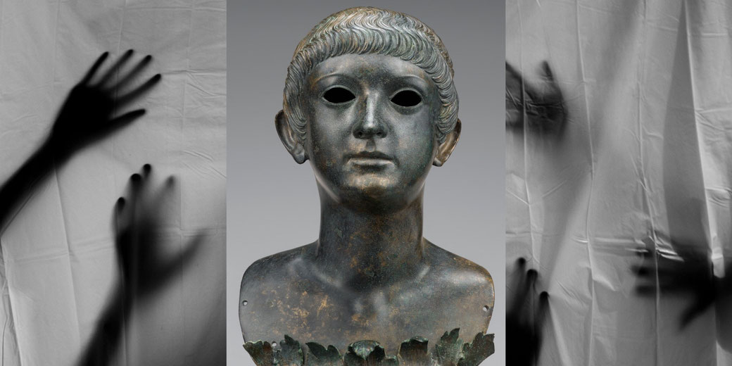 Marble bust of a Roman youth with short curls and a calm expression, possibly depicting a young aristocrat.