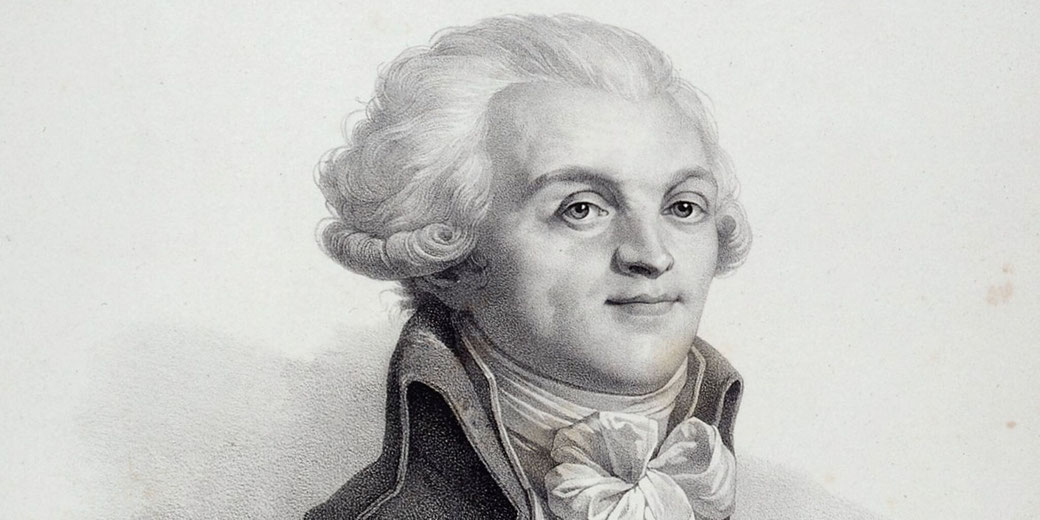 A monochrome portrait shows a man with curled white hair, dressed in 18th-century attire with a high collar and cravat, facing slightly to the right.