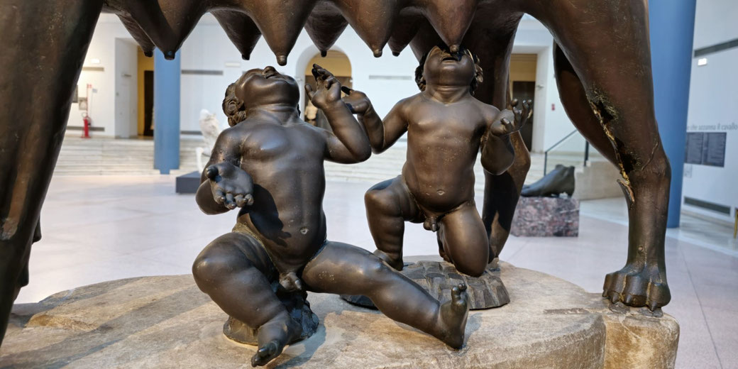 Bronze figures of Romulus and Remus as infants suckling from the she-wolf, part of the Capitoline Wolf statue.