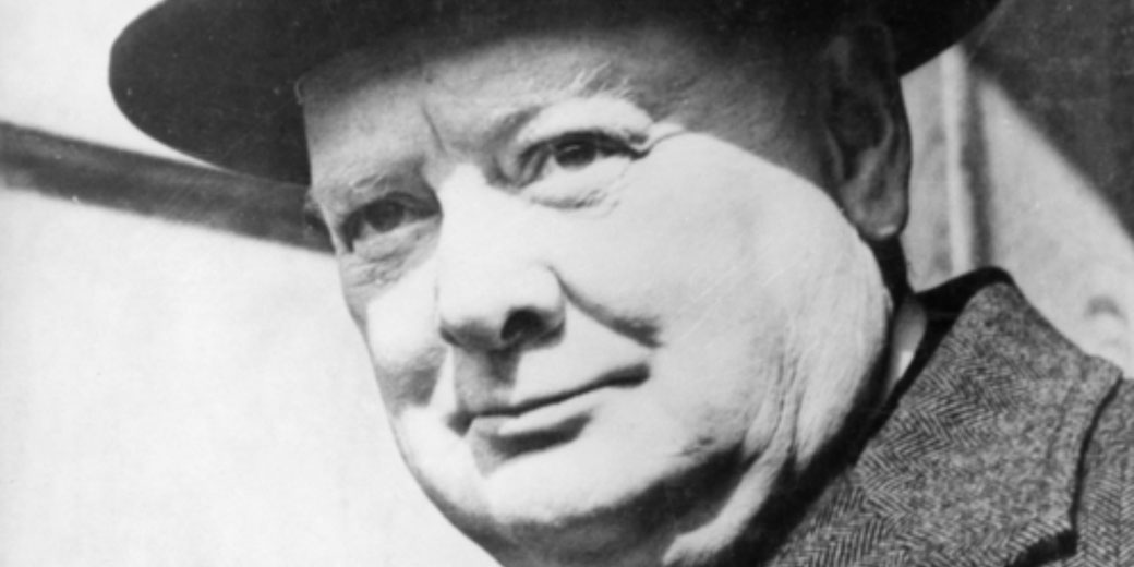 Winston Churchill captured departing No. 10 Downing Street during World War II, wearing a dark coat and hat