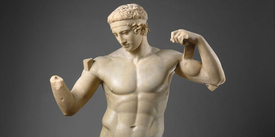 Roman marble statue fragment of a victorious youth tying a fillet around his head, based on a Greek sculpture attributed to Polykleitos.