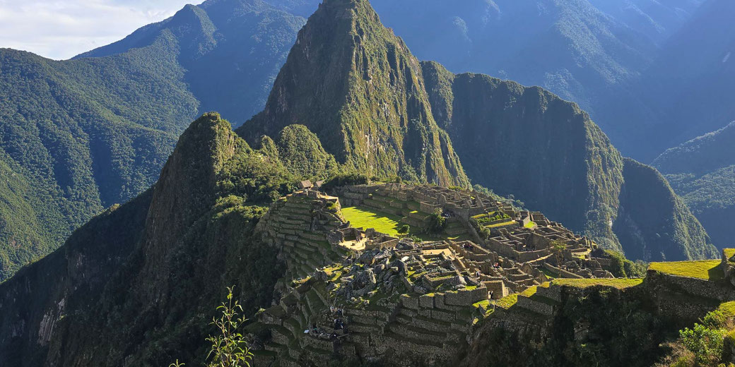 Machu Picchu, the ancient Inca citadel in the Peruvian Andes. Built in the 15th century, its terraces, stone structures, and dramatic mountain backdrop make it a UNESCO World Heritage Site.