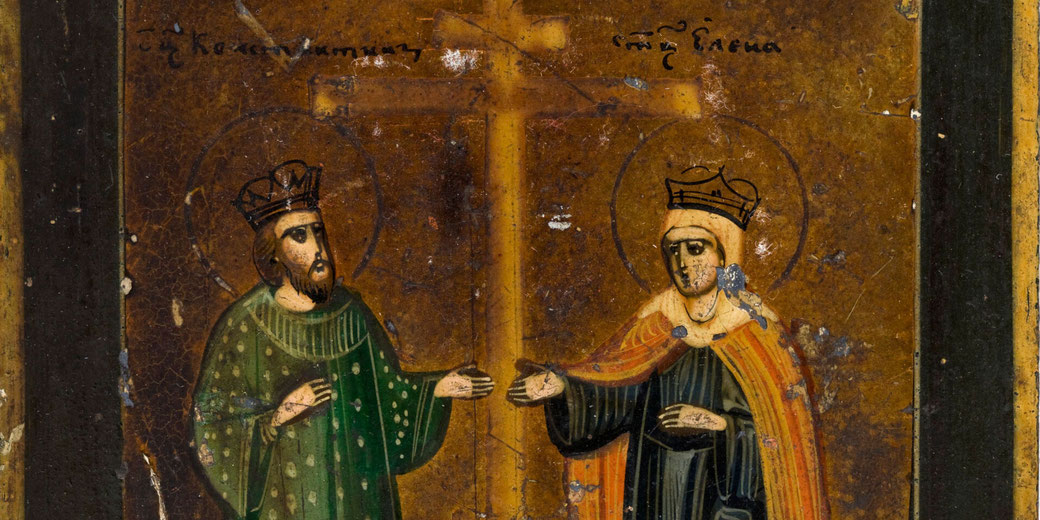Byzantine-style icon showing crowned figures of Constantine and Helena flanking a large cross, set against a worn golden background.