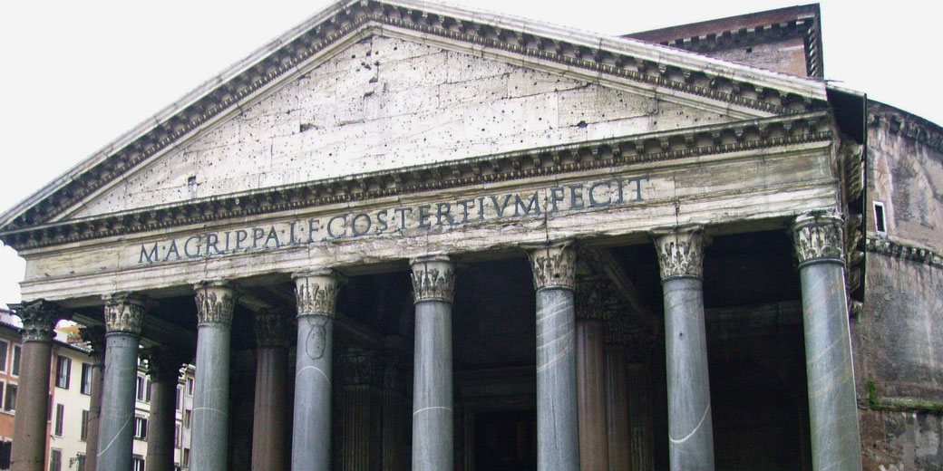 Front view of the Pantheon in Rome, showing its massive Corinthian columns and the inscription attributing it to Agrippa.
