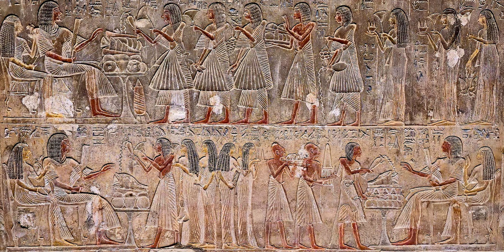 An intricate ancient Egyptian relief depicting a vibrant scene of daily life and offerings, featuring figures in traditional attire presenting goods, surrounded by hieroglyphs on a stone background.