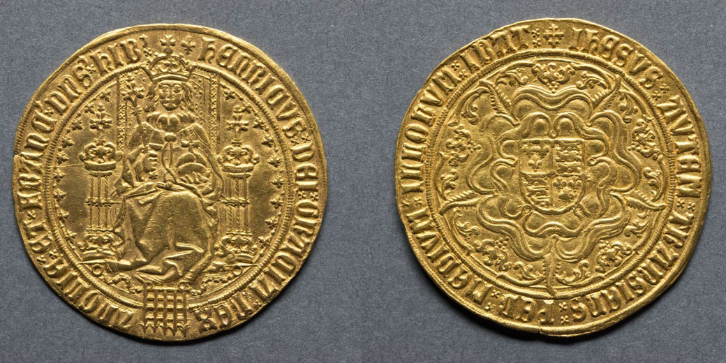 A gold sovereign coin bearing a crowned Henry VII enthroned on the obverse and a Tudor‑rose‑framed shield of arms on the reverse.