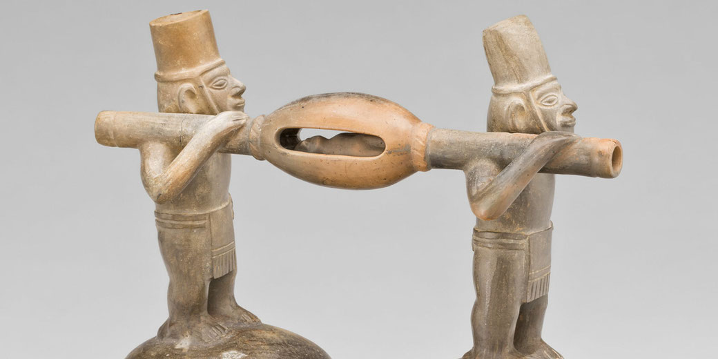 A Chimú-Inca ceramic double vessel from Peru’s North Coast, depicting figures in a funerary ritual procession—an expressive representation caught in simple, bold form.