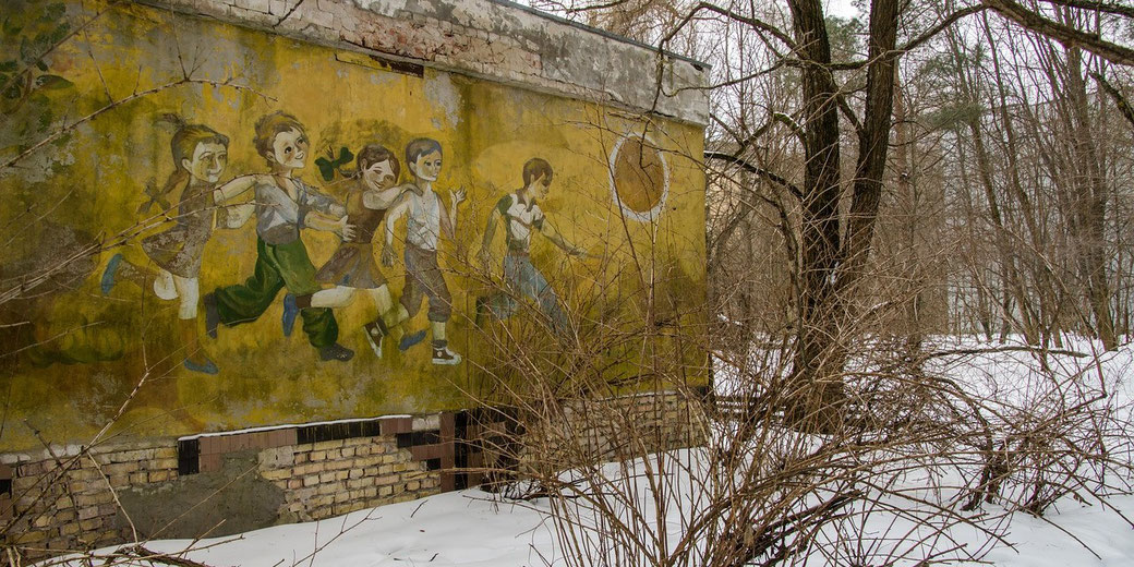 Painted mural of children playing