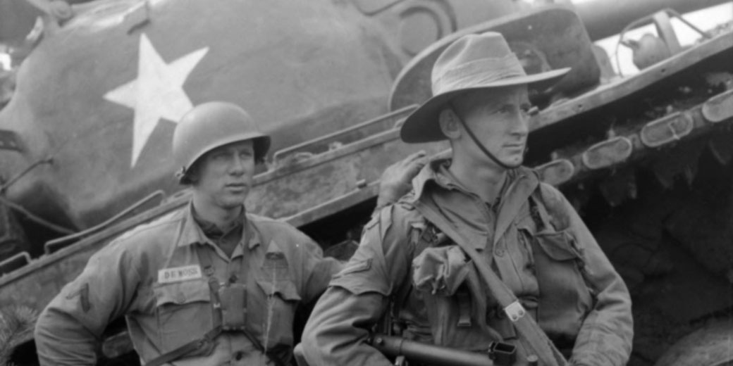 American and Australian soldiers collaborate during a 1955 Korean War exercise near the truce line.