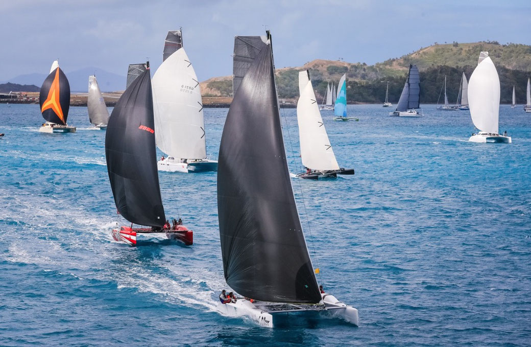 Catamarans Mad Max and Boatworks leading the fleet at Hamilton Island Race Week