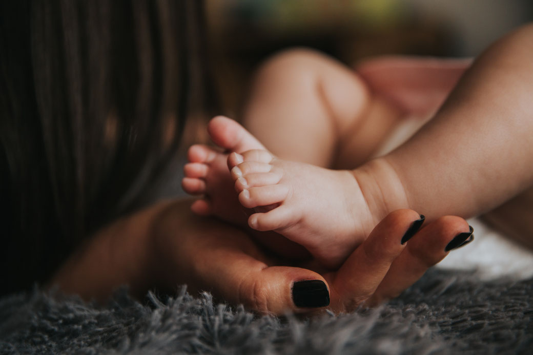 mother with newborn postpartum therapy support