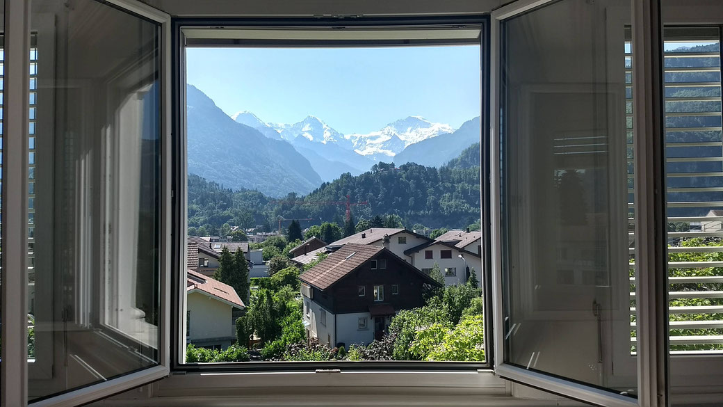 because of these views did the 5-star Victoria Jungfrau hotel want to build their hotel on the location of the Adventure hostel Interlaken