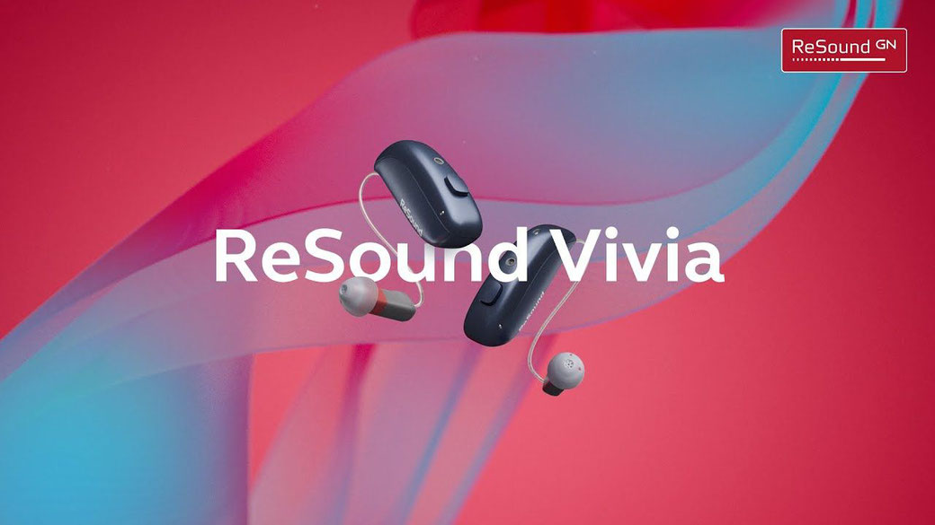 Two ReSound Vivia microRIE on a vibrant red background with blue waves