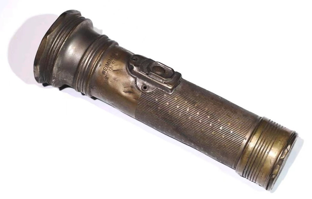A Wei Ming flashlight, identical in design to the original Eveready models. From the MOFBA collection.