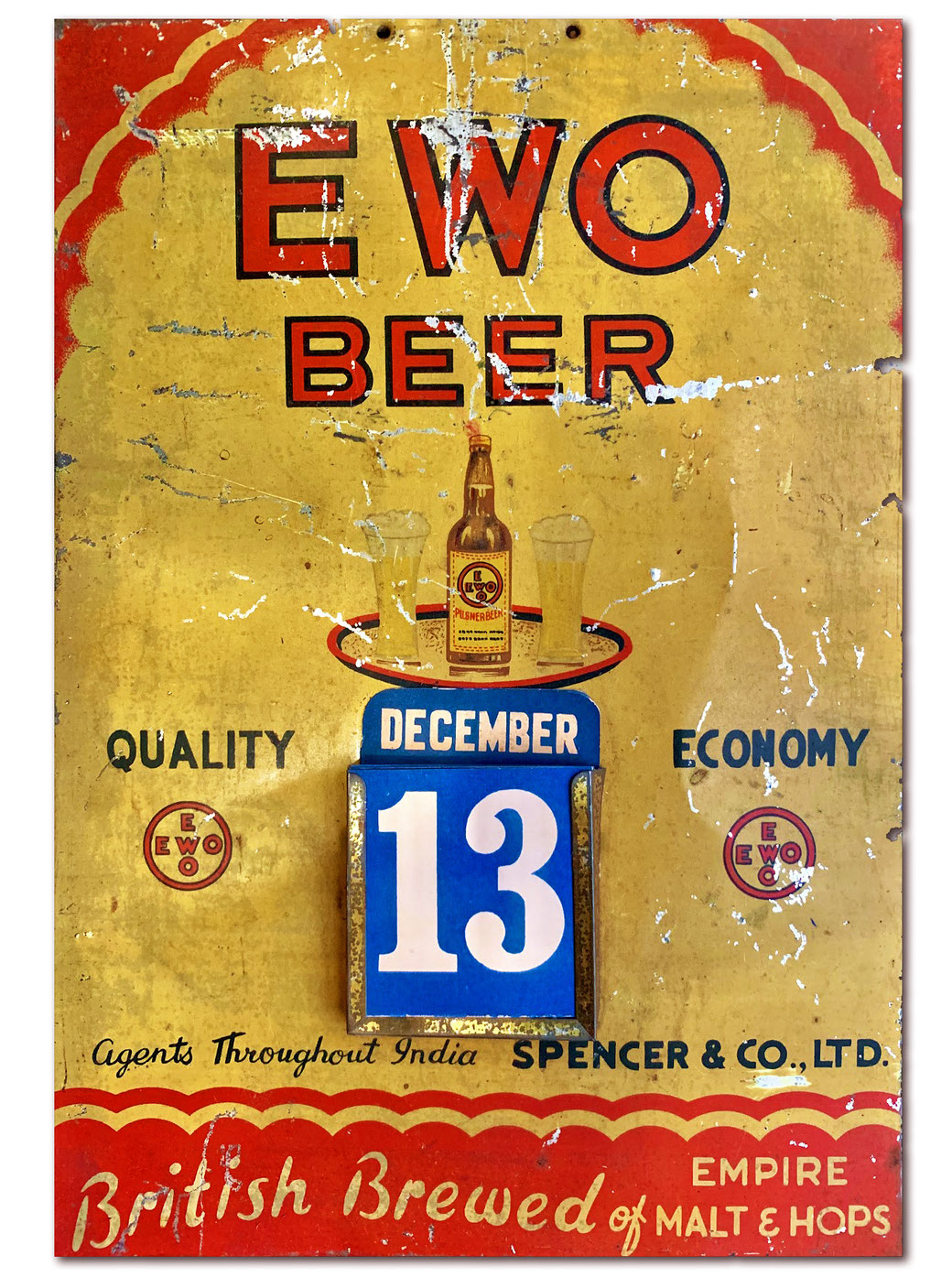 Vintage metal advertising calendar from India for EWO Beer, brewed in Shanghai China. From the MOFBA collection.