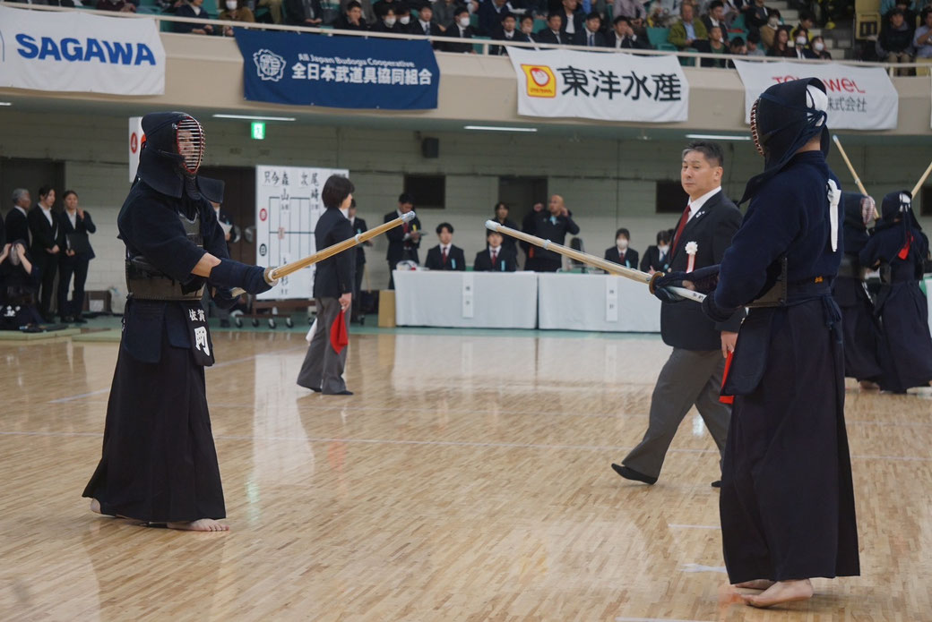 岡選手