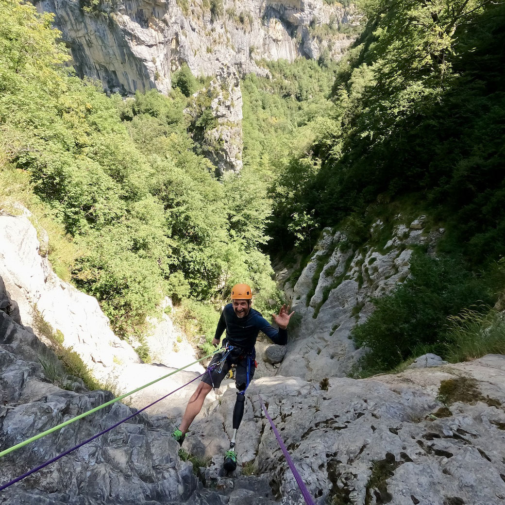 The entry into the canyon is via a three pitch abseil totalling 65 meters.