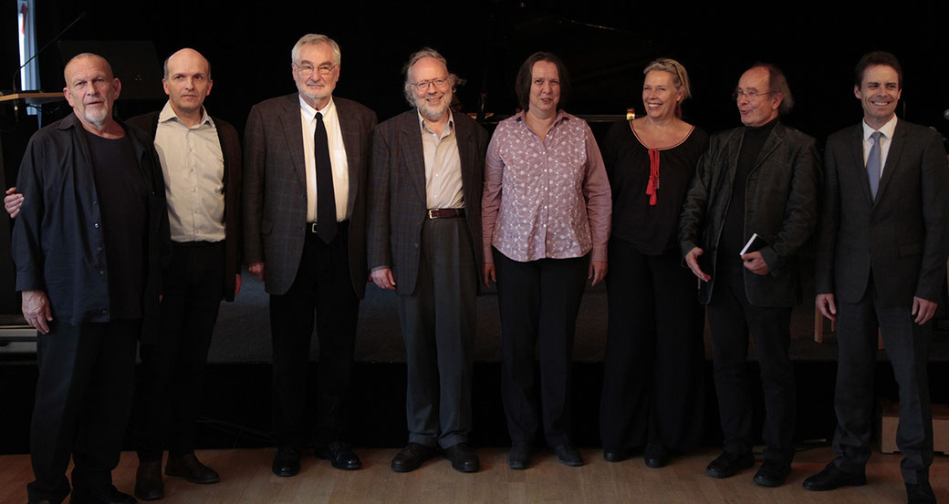 From the left: Peter Michael Hamel, Christoph Schlüren, Ernst Pöppel, Wolfgang Andreas Schulz, Christa Bützberger, Mareile Vaupel, Michael von Brück, Patrick Lang in "Freies Musikzentrum" in Munich