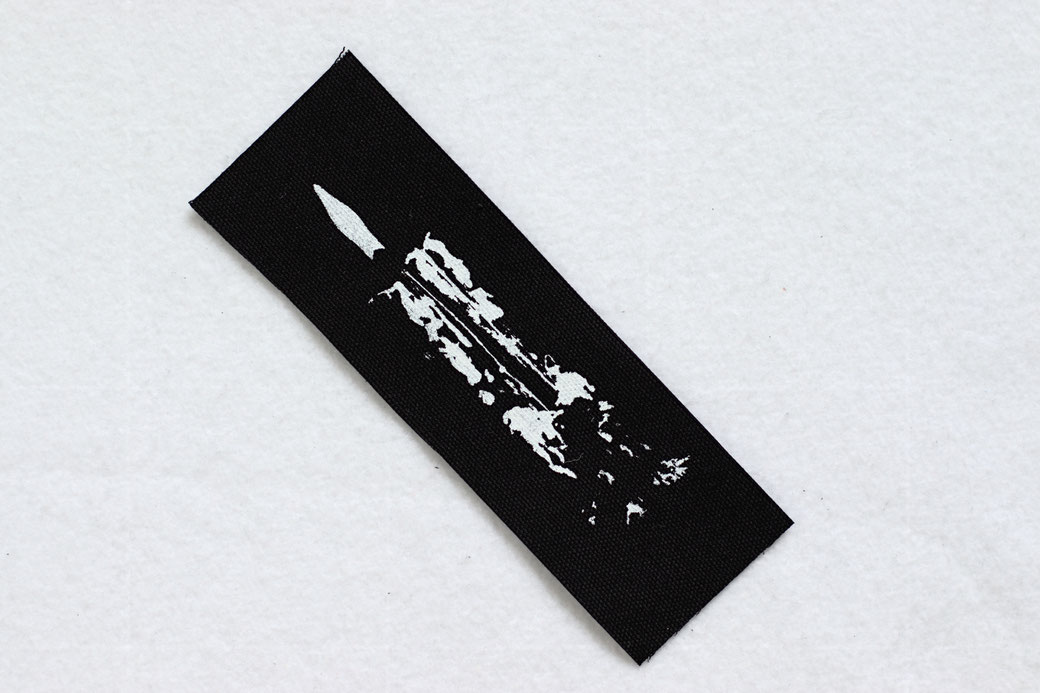 Dripping Candle patch, white ink screen-printed on black organic canvas by Zebraspider Eco Anti-Fashion