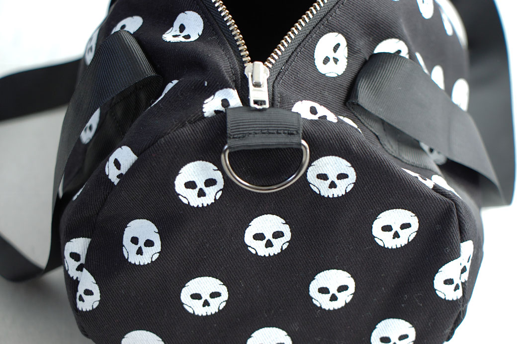 New bags - duffle handbags and zipper pouches - polka skulls on black twill - Zebraspider Eco Anti-Fashion