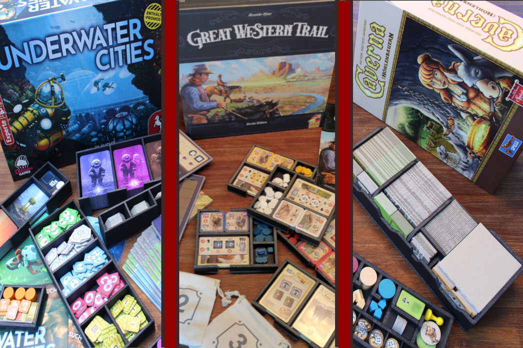 Brettspieleinsätze oder Inserts für Underwater Cities, Great Western Trail und Caverna. Die Inlays sind mit Spielmaterial befüllt.