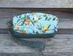 grande pochette a maquillage femme en faux cuir kaki et tissu vert clair avec des oiseaux
