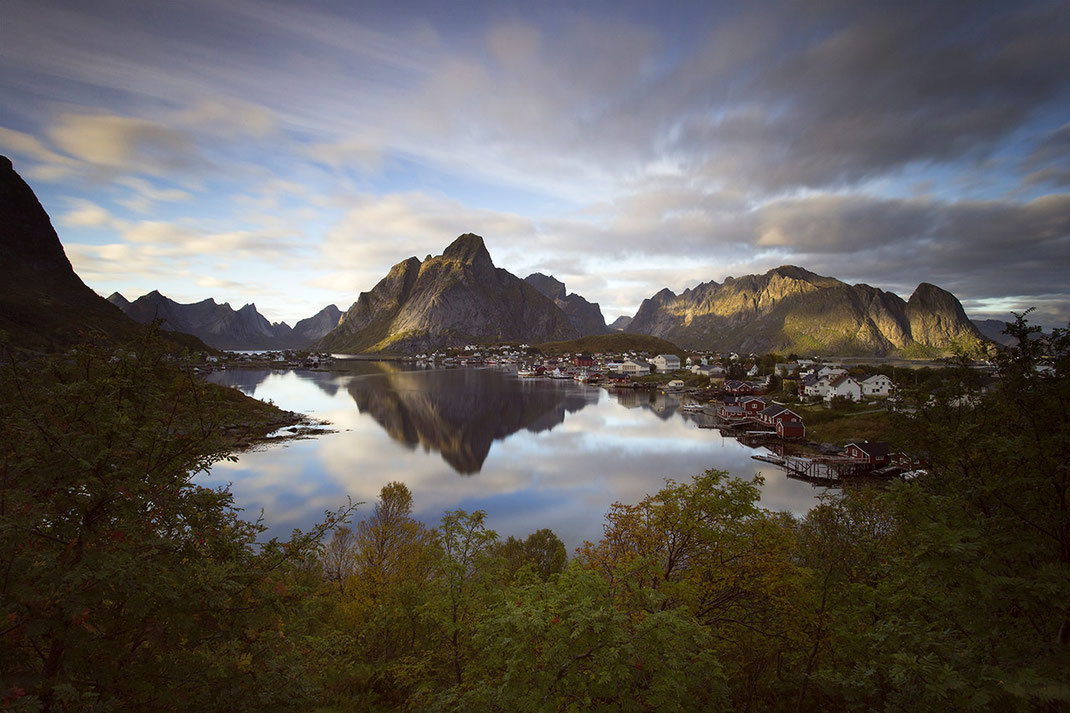Beautiful Reine village surrounded by mountains and ocean water, long exposure, Lofoten Islands, Norway, 1280x853px
