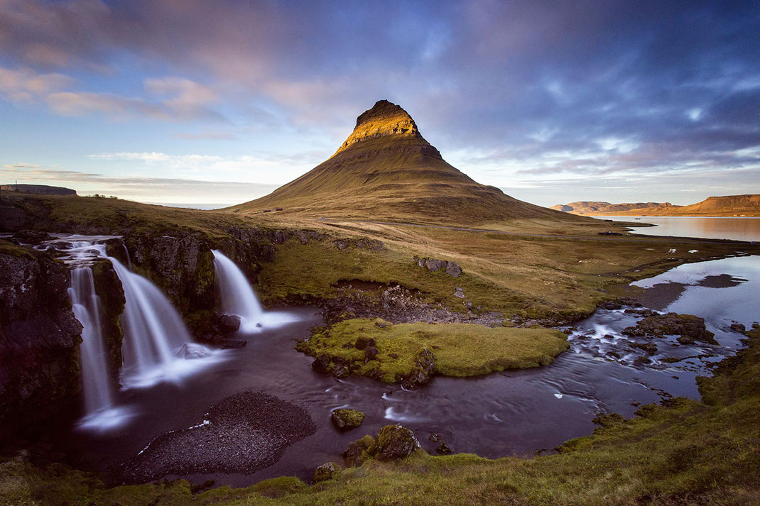 Kirkjufell waterfall and mountain at sunset, long exposure, Snaefellsnes, Iceland