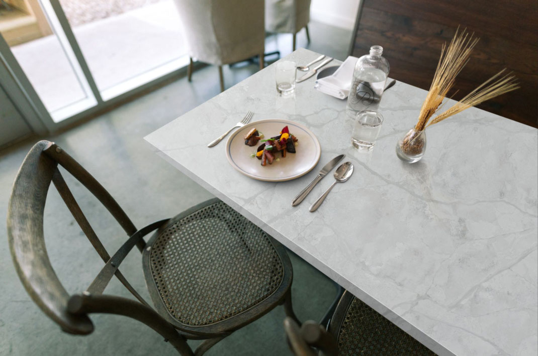 Kitchen table surface from grey Sodostone engineered quartz