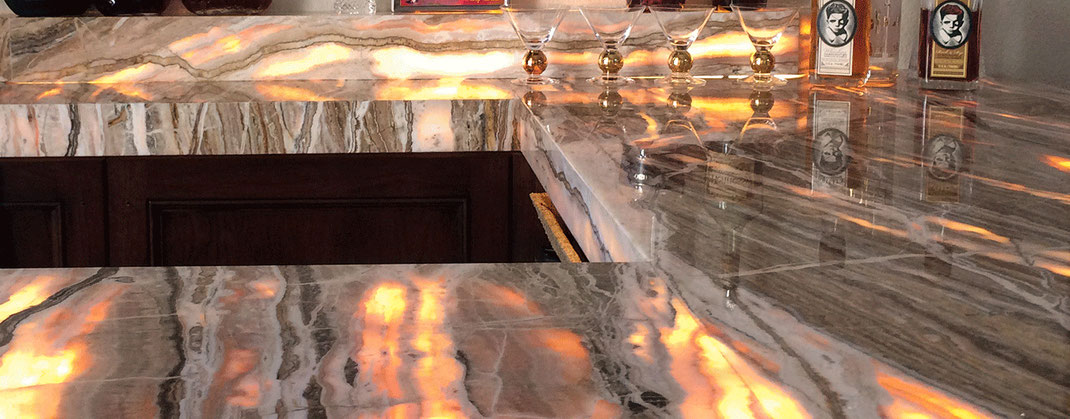 This bar countertop from onyx transmits light coming from beneath it 