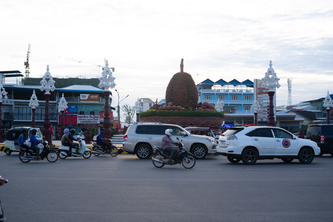 A large statue in a traffic circle in Kampot city.