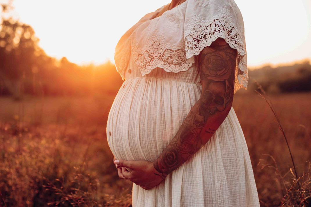 Babybauch Sonnenuntergang