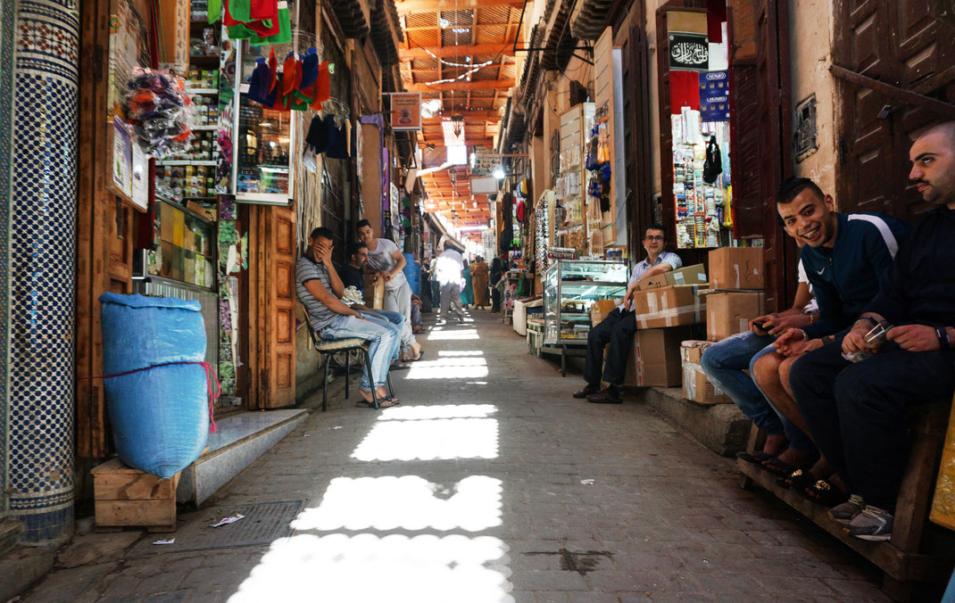 View into the shadowed narrow streets of the Medina, Fez