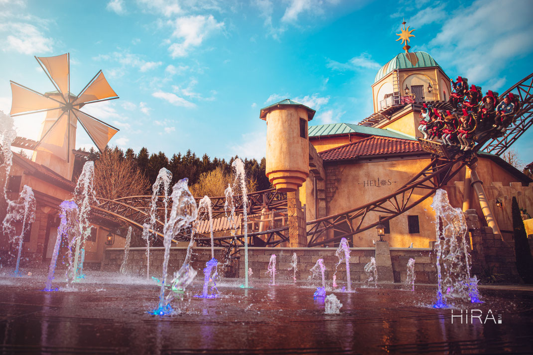 Roller Coaster Helios, Water Playground Element and Mediterranean theming in warm colors 