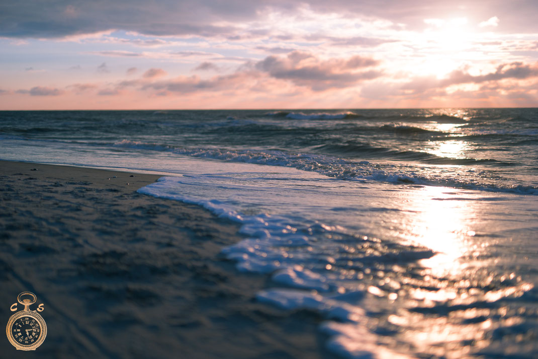 Waves against a fantastic sunset 3