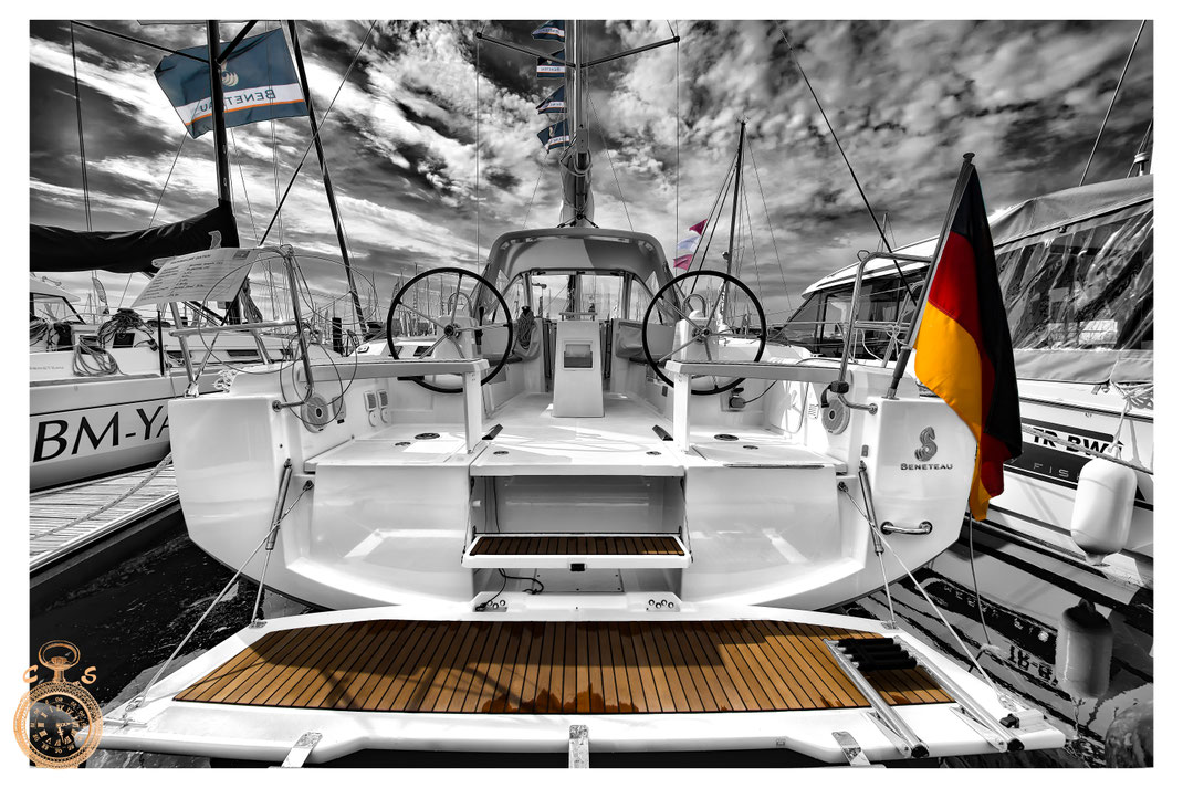 Waves against a fantastic sunsetSailboat in black white against a strong sky, Color Touch Effects